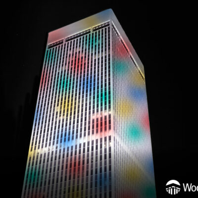 WoodmenLife Tower lit with confetti