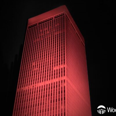WoodmenLife Tower glowing red